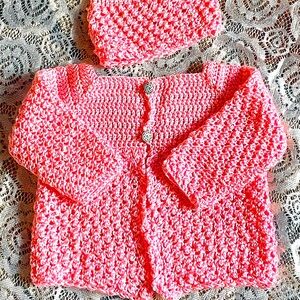 Crochet baby sweater with hat